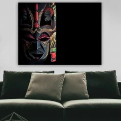 Lerretsbilde 70x100 cm - Fargerik afrikansk maske med detaljerte mønstre og uttrykksfulle trekk