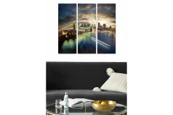 Lerretsbilder|Lerretsbilder-Trelerretsbilde 3-delt 50x70 cm - Bysilhuett ved solnedgang med bro og refleksjoner i vannet Flerfärgad